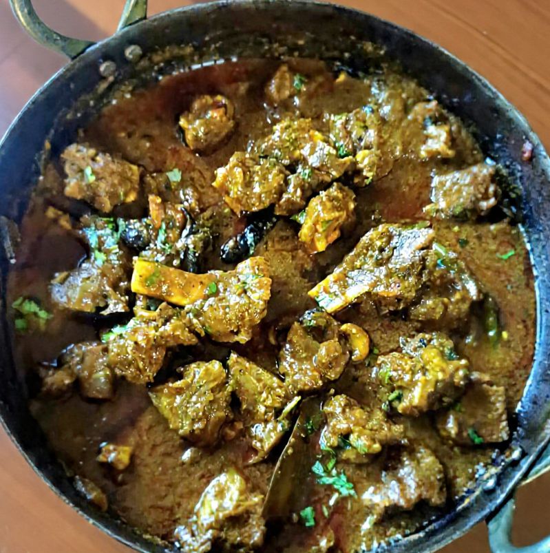 The ultimate slow cooked MuttonBhuna Tikkazndcurriez Style.